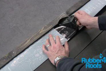 Remove release paper from edge